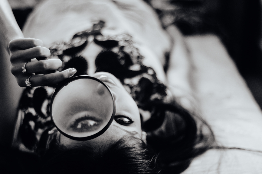 woman with magnifying glass