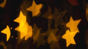 yellow stars on black background