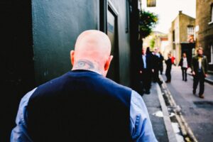 man with neck tattoo