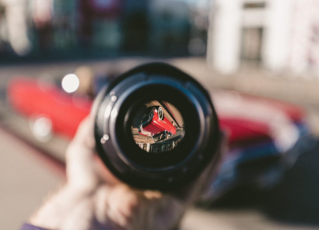 lens looking at car