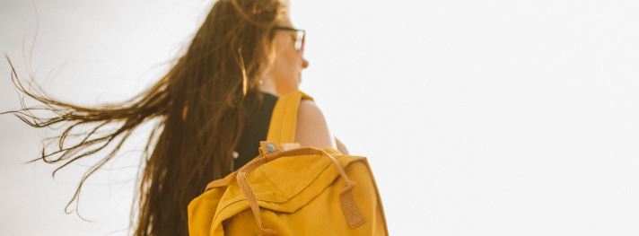 girl with yellow backpack