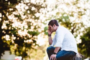 man sitting outside