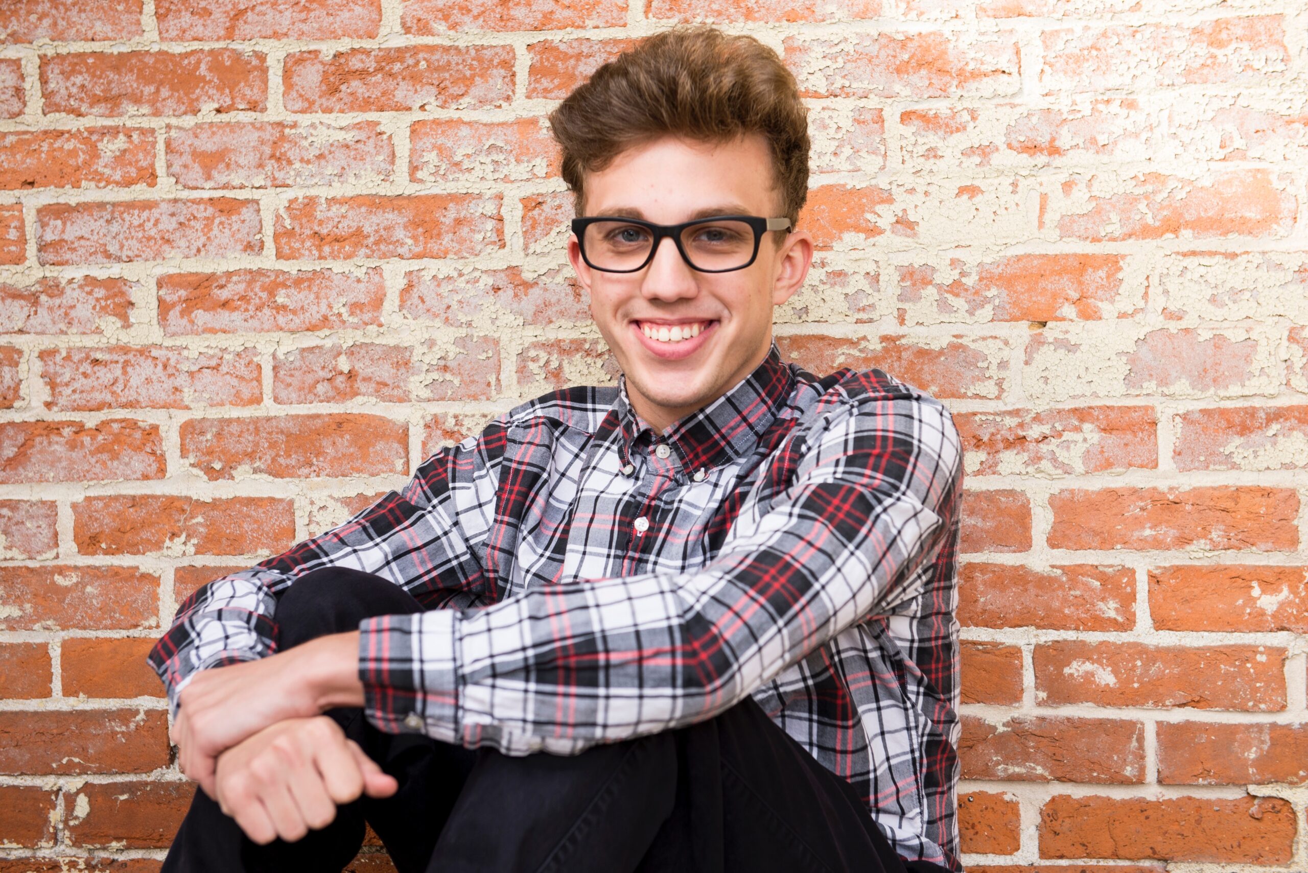 man smiling in glasses