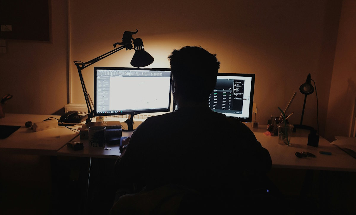 working at computer in the dark