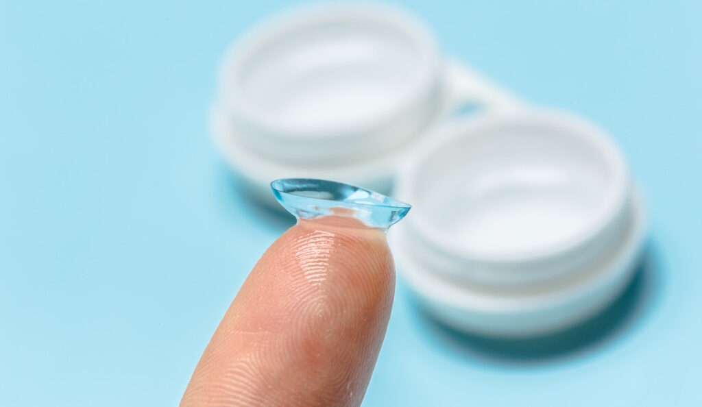 contact lens on fingertip