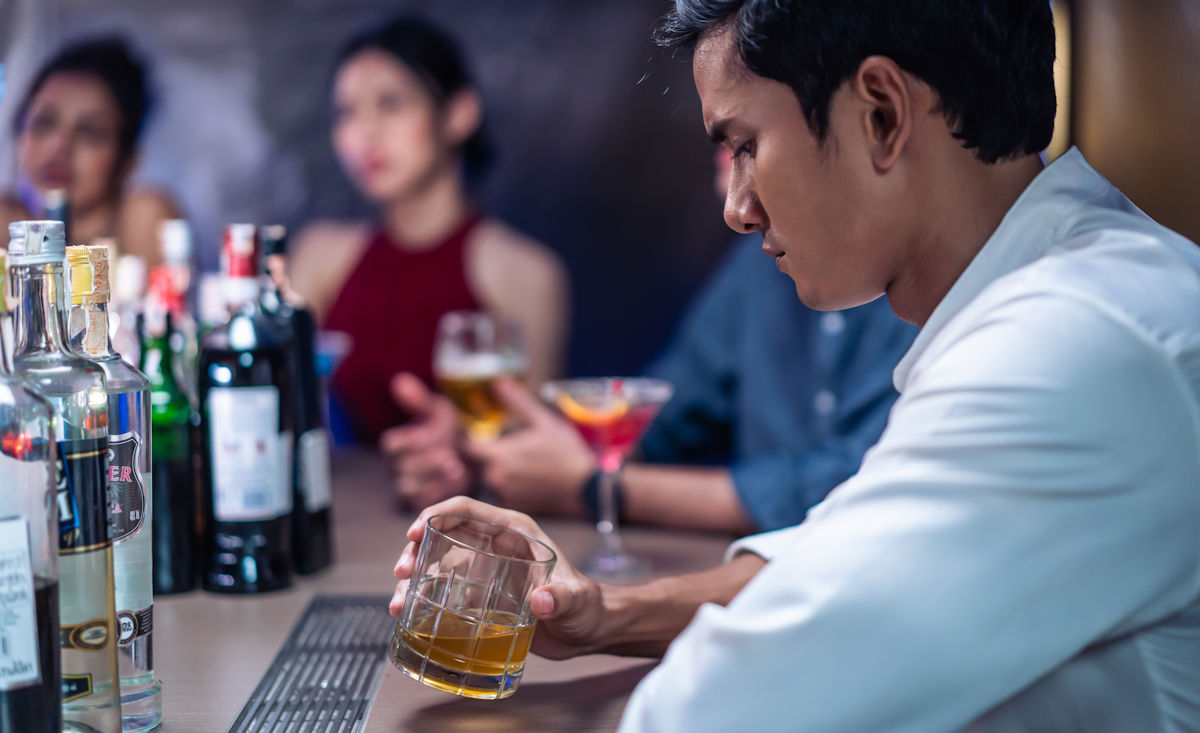 man having a drink