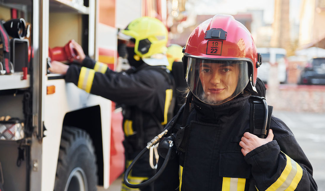 firefighter by the truck