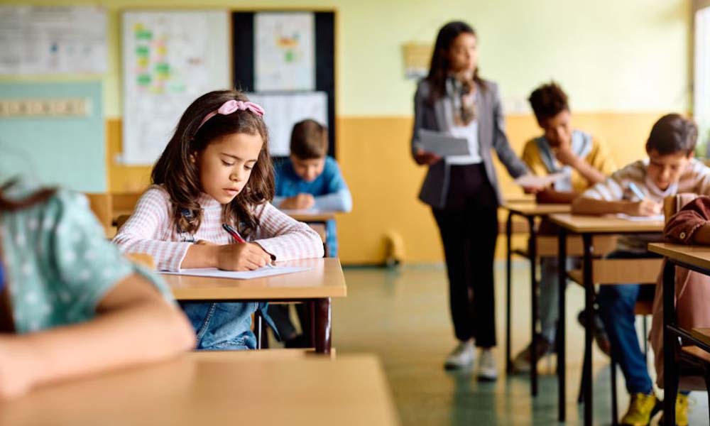 kids and teacher in classroom