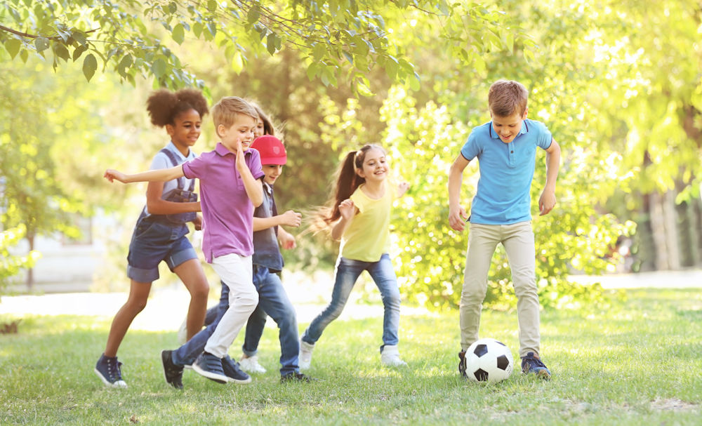 kids playing soccer outside