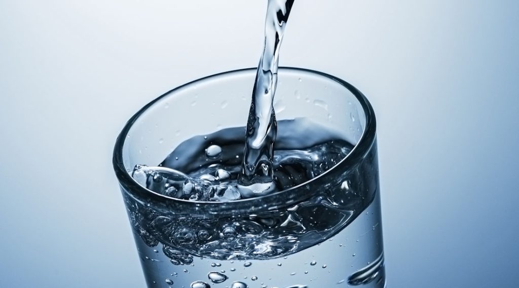 pouring glass of water