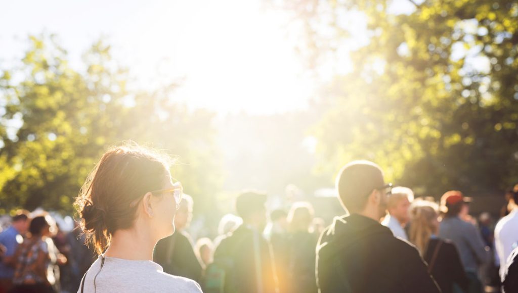crowd of people in the sun